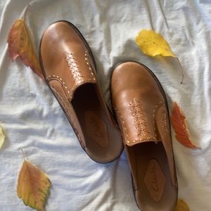 Embroidered leather CLARKS slip Ons